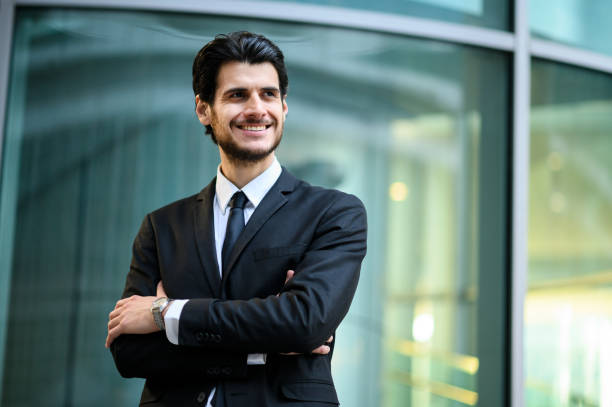 istock Young businessman outdoor smiling confidently 1250924283