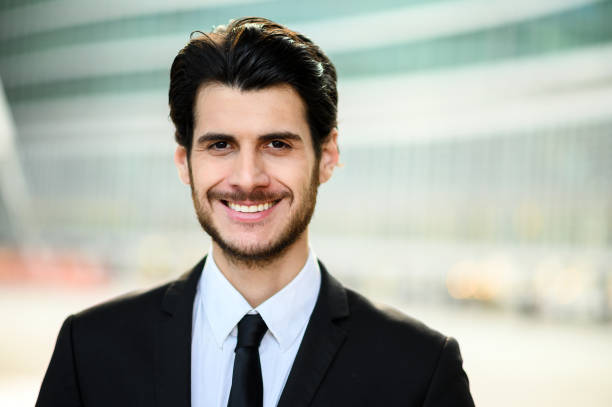 istock Young businessman outdoor smiling confidently 1250924421