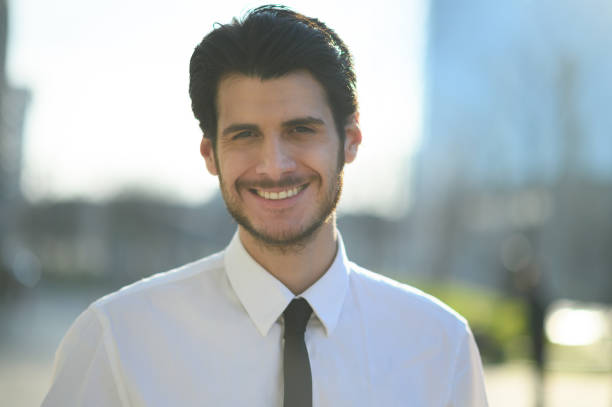 istock Young businessman walking outdoor looking confident 1250924446