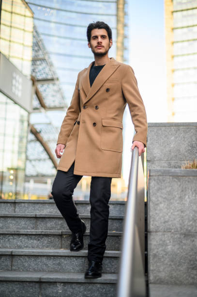 istock Handsome elegant man taking stairs in a modern city 1250924552