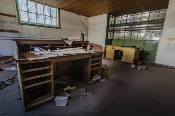 istock desk in abandoned factory 1250924581