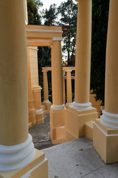 istock architecture and heritage concept - group of yellow columns in the park 1250926353