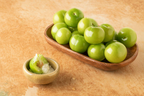 istock closeup fresh and ripe green plums on a table served with salt 1250926623