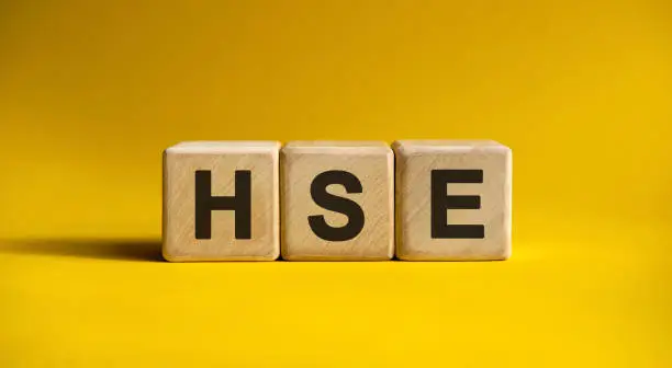 HSE text on a yellow background on wooden cubes