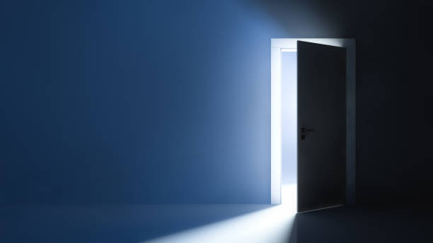 Bright light behind the slightly ajar door. Abstract background. Bright light behind the slightly ajar door. Abstract background door stock pictures, royalty-free photos & images