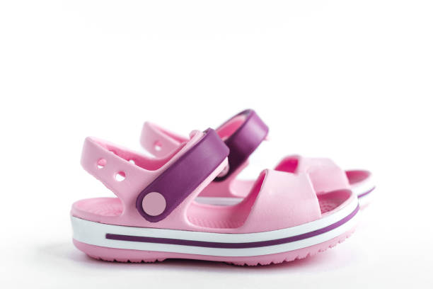 istock isolated children's pink summer sandals on a white background 1 1250934954