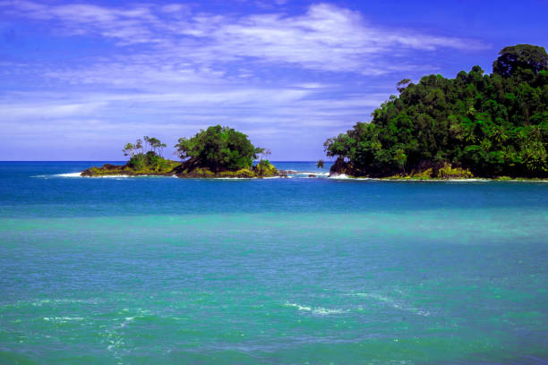 One of the tourist destinations in the Lageun region, Calang, Aceh Jaya, Aceh. Friday 19 June 2020. The beach attraction of Plieng Lageun Island is a destination for tourists just before the New Normal or new life of the Covid-19 pandemic that will be enforced by the Aceh Government and the local District Government. The destination to this area is because the tourism objects are very beautiful with green natural charm and the beautiful blue sea is so alluring.