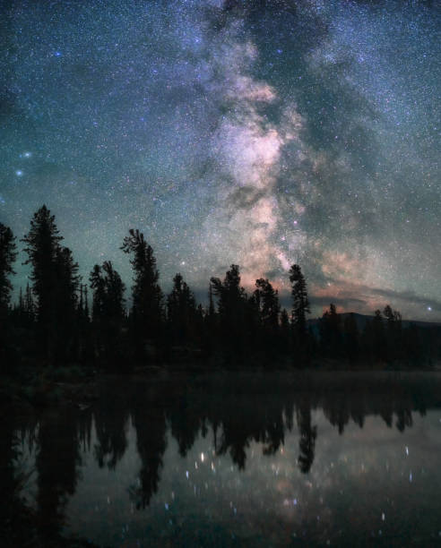 istock Milky Way galaxy rises over the forest in summer time 1250937942