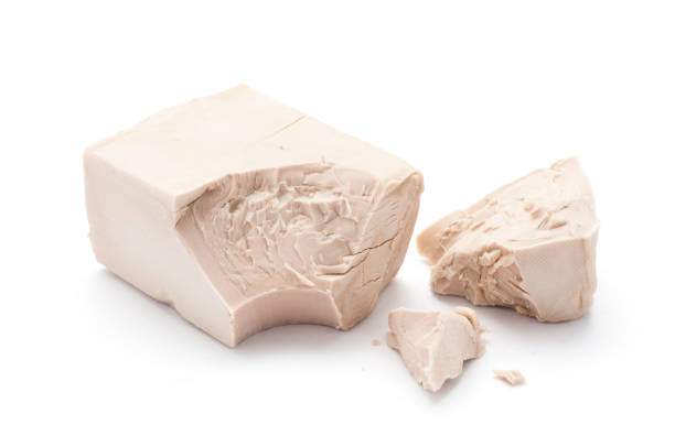 istock A stick of fresh brewer's yeast on white background. 1250938847