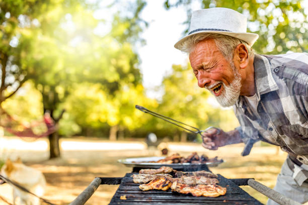 istock Preparing barbecue party outside in the backyard 1250938857