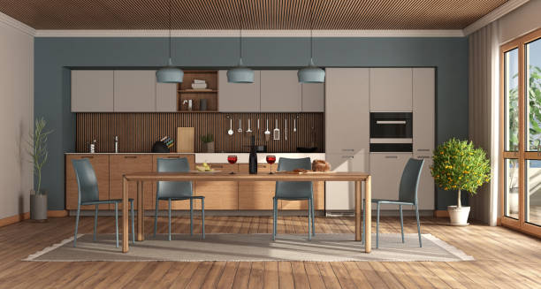 istock Modern kitchen with wooden table and blue chairs 1250948069