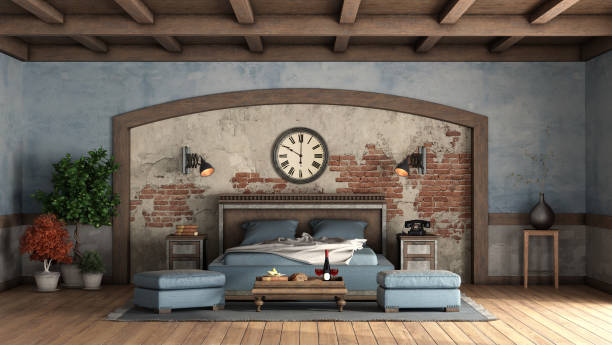 istock Rustic master bedroom with old walls and wooden double bed 1250949041
