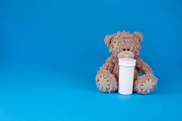 istock Toy bear with medical mask 1250955831