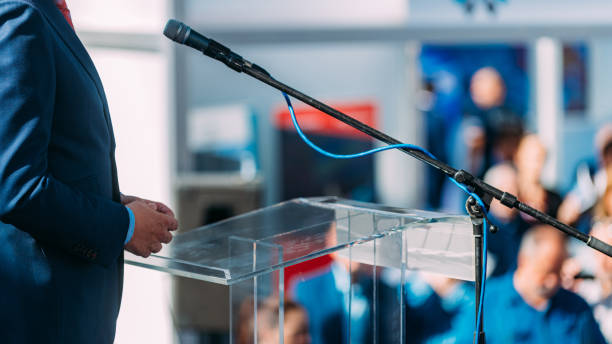 istock Close-Up Of Man Giving Speech 1250957576