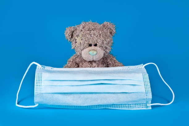 istock Toy bear with medical mask 1250960365