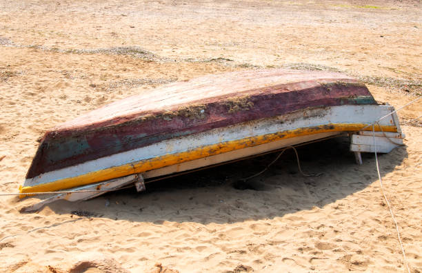 istock weathered wooden row boat qingdao china beach 1250960638
