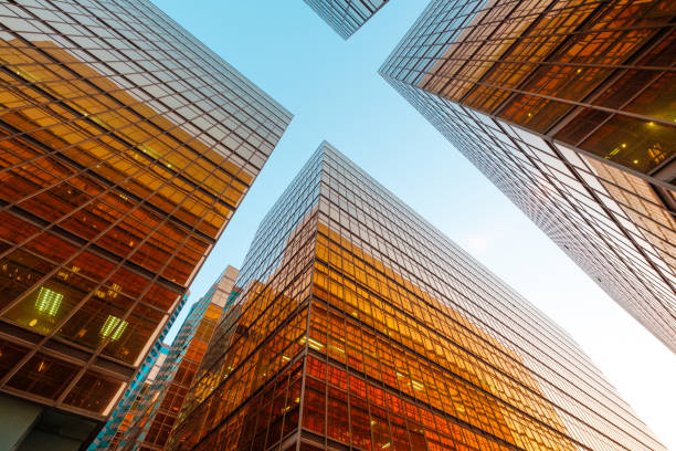 istock golden office building facade and blue sky 1250962789
