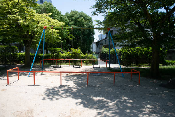 istock Playground equipment in the park. Scene with a slide 1250962809