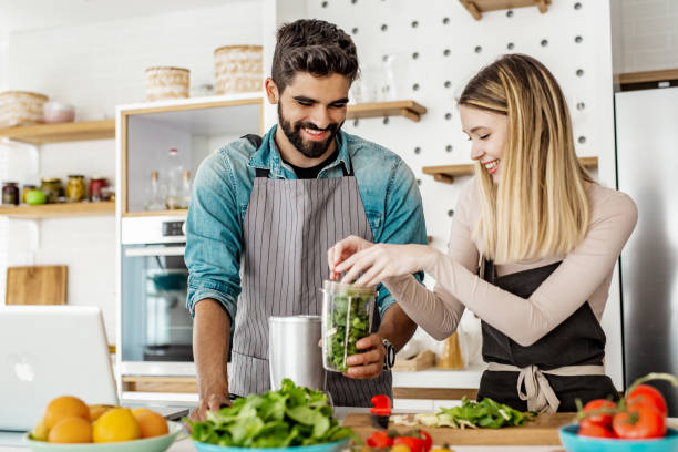 istock Young couple is preparing healthy meal 1250964187