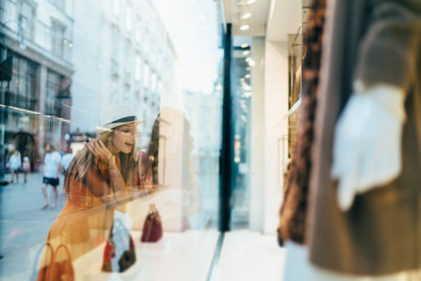 istock Women shopping together 1250966698