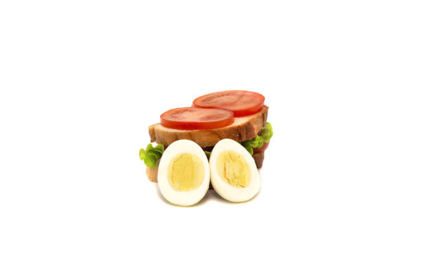 istock sandwich of white bread, tomatoes, green salad and chicken eggs 1250967940