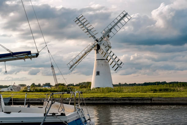 istock Thurne Mill on Thurne Dyke in the Norfolk Broads 1250969082