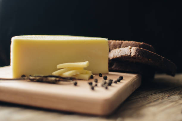 istock Cheese and bread on the wooden desk. Copy space. 1250969839