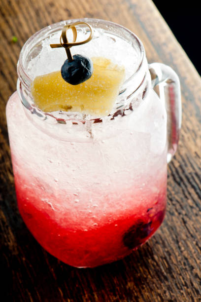 istock Cocktails. Alcoholic Drinks made with gin, vodka, rum or whiskey mixed with soda water, fruit juices and garnishes with limes and cherries. Classic American bar drinks. 1250970329