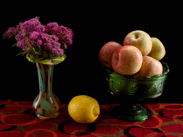 istock Apples, lemon and fuchsia flowers 1250970498