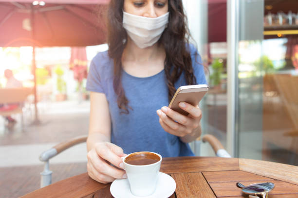istock Woman with face protective mask 1250973867