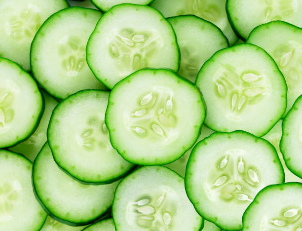 istock fresh cucumber slices background 1250982414
