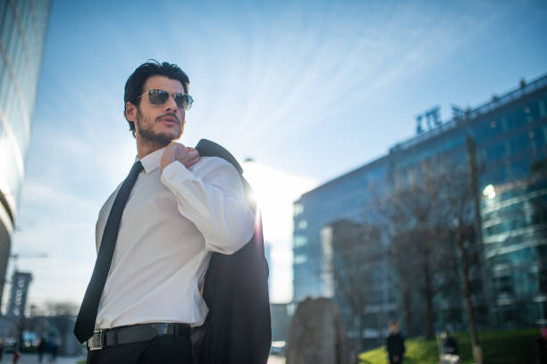 Portrait of a businessman walking in a city