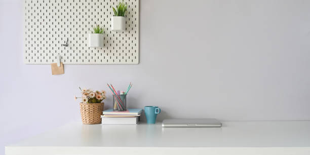 istock A comfortable workspace is surrounding by office equipment. 1250985244