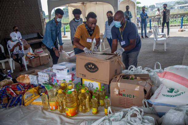 Covid ethiopia June 20/2020 Addis Ababa ,Ethiopia A group of Gospel musicians band came together with an initiative called sharing food to the needy amid Covid-19. addis ababa ethiopia photos stock pictures, royalty-free photos & images