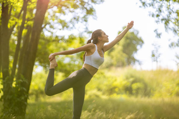 istock Fit young woman exercising in nature 1250996875