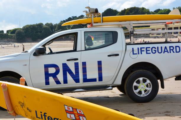 barry island wales. after weeks in lockdown lifeguards are back - lifeguard association imagens e fotografias de stock