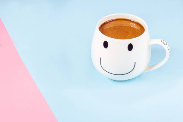 istock Black coffee in a white big cup on a pink and blue background 1251005010