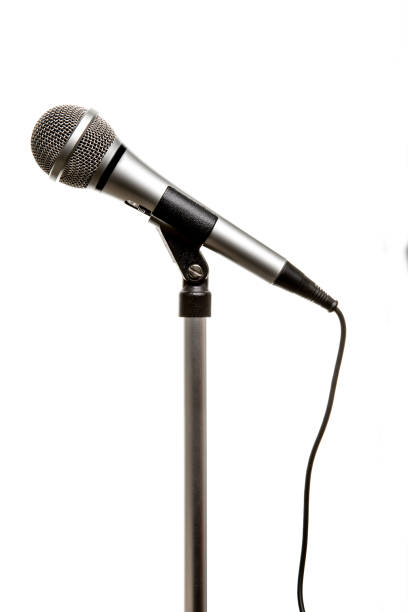 istock Chrome microphone seen from the side isolated on a white background 1251005307