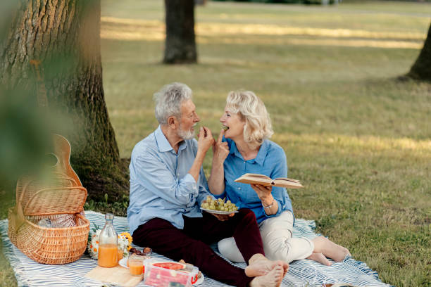 istock Senior Couple Eating Grapes 1251007224