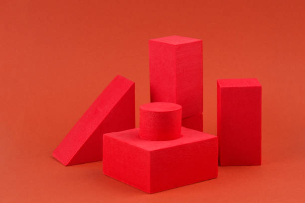 istock Red geometric shapes on brown background. Template composition for advertising, products. 1251007725