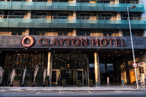 Dublin, Ireland - January 1, 2020: Facade of the Clayton hotel in the Docklands of Dublin, Ireland