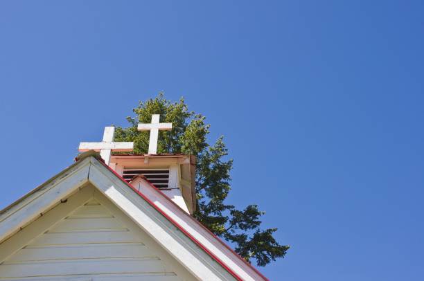 istock Bell tower on white church 1251010137