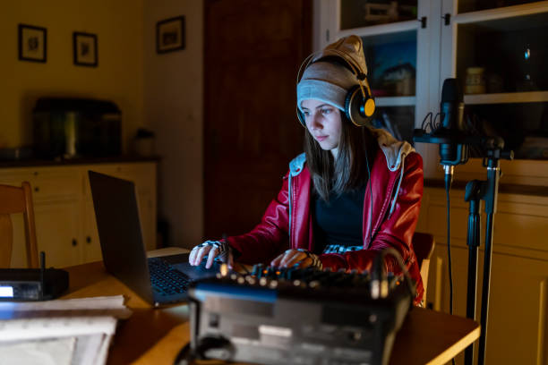 istock DJ streaming from home at night 1251012658