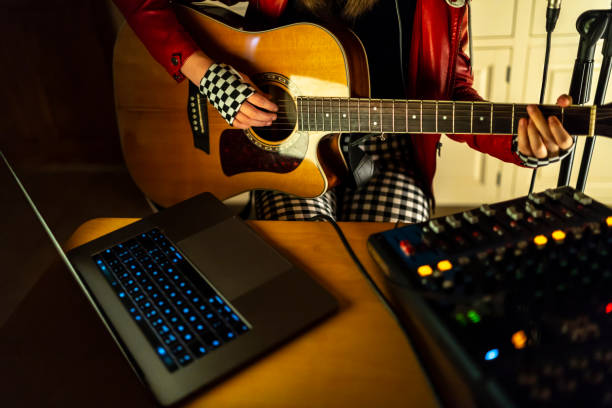 istock Close up of a guitar player 1251012672