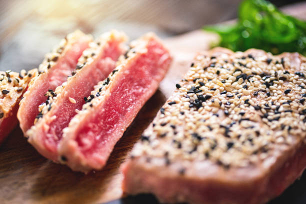 istock Grilled Tuna Steak with ingredients ready to eat 1251017284