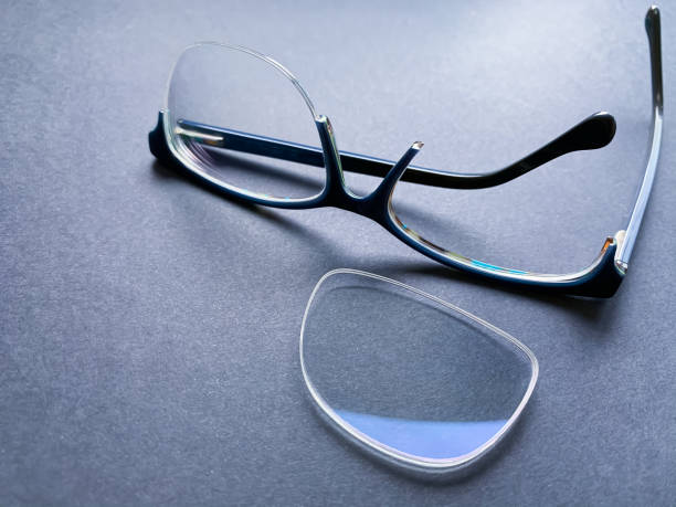 istock broken rim on a dark background.  glasses for vision correction. 1251017556