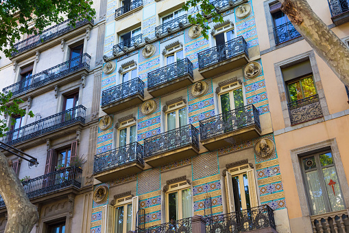 Barcelona, Spain - May 16, 2017: Details of the one of the typical old buildings in modern style in the historical center of Barcelona.