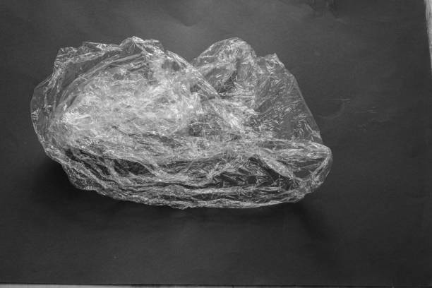 istock Wrinkled plastic bag isolated on grey background 1251017848