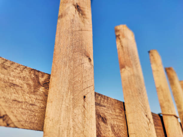 istock Wooden fence for wallpaper design 1251020345