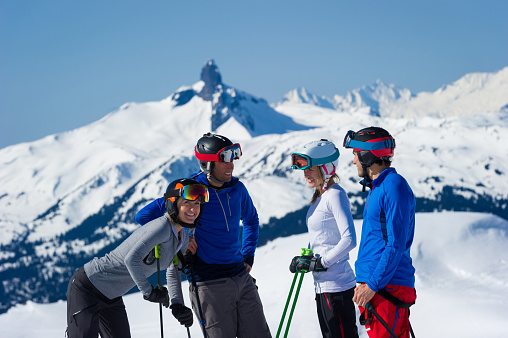 Couples bonding through sport. Top ski destinations in North America. Skiing with friends.